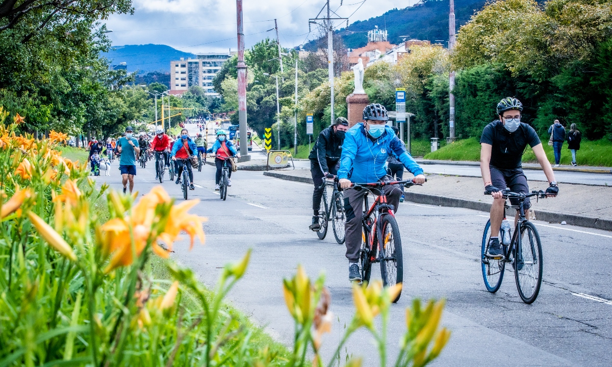 Cyclists and pedestrians using the bike lane